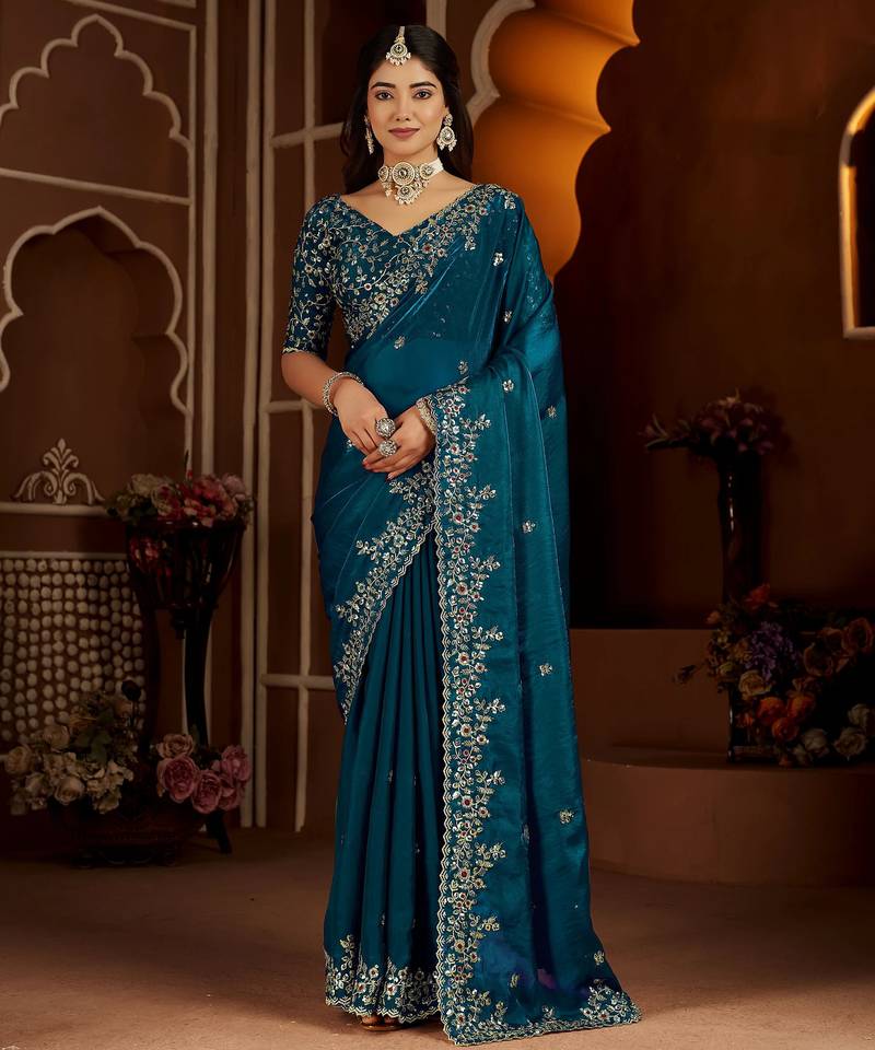 Blue jimmy choo zari butti work embellished wedding wear saree