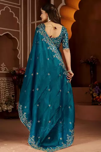 Blue jimmy choo zari butti work embellished wedding wear saree