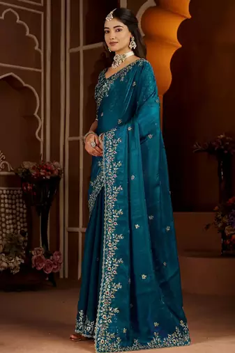 Blue jimmy choo zari butti work embellished wedding wear saree