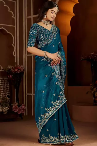 Blue jimmy choo zari butti work embellished wedding wear saree