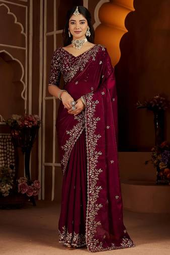 Wine jimmy choo zari butti work embellished wedding wear saree