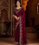 Wine jimmy choo zari butti work embellished wedding wear saree