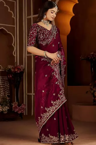 Wine jimmy choo zari butti work embellished wedding wear saree