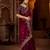 Wine jimmy choo zari butti work embellished wedding wear saree