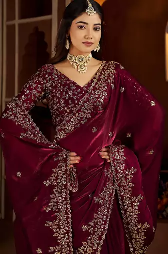 Wine jimmy choo zari butti work embellished wedding wear saree