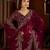 Wine jimmy choo zari butti work embellished wedding wear saree
