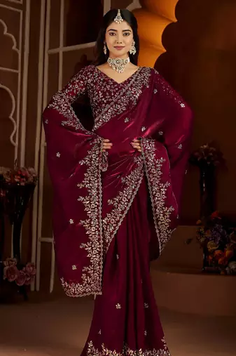 Wine jimmy choo zari butti work embellished wedding wear saree