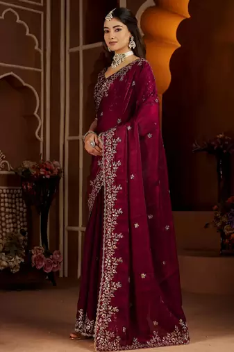 Wine jimmy choo zari butti work embellished wedding wear saree