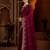 Wine jimmy choo zari butti work embellished wedding wear saree