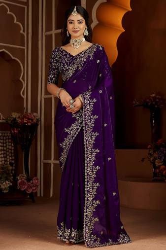 Purple jimmy choo zari butti work embellished wedding wear saree