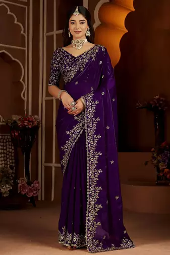 Purple jimmy choo zari butti work embellished wedding wear saree