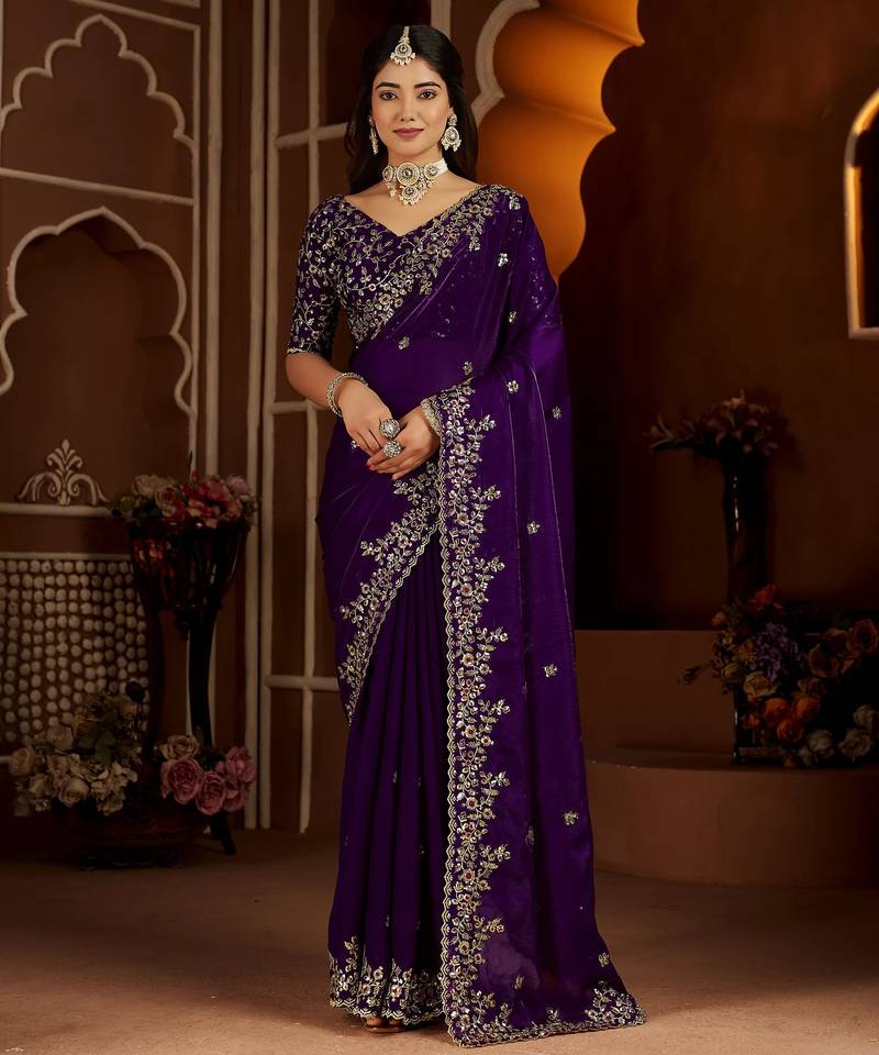 Purple jimmy choo zari butti work embellished wedding wear saree