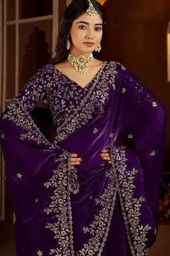 Purple jimmy choo zari butti work embellished wedding wear saree