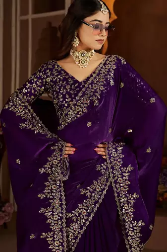 Purple jimmy choo zari butti work embellished wedding wear saree