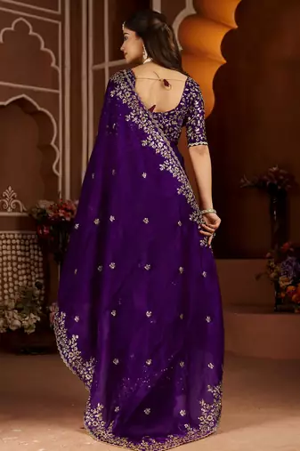 Purple jimmy choo zari butti work embellished wedding wear saree