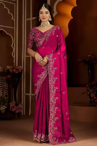 Pink jimmy choo zari butti work embellished wedding wear saree