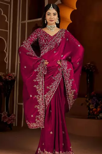 Pink jimmy choo zari butti work embellished wedding wear saree