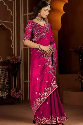 Pink jimmy choo zari butti work embellished wedding wear saree