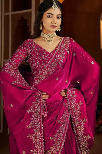 Pink jimmy choo zari butti work embellished wedding wear saree