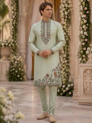 Green embroidered & sequence work silk blend straight kurta set 1