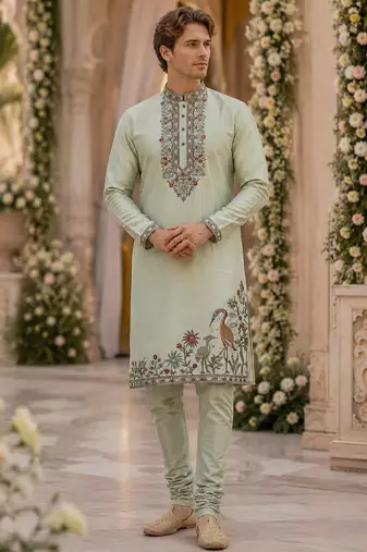 Green embroidered & sequence work silk blend straight kurta set