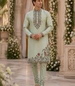 Green embroidered & sequence work silk blend straight kurta set