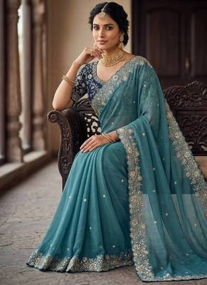 Teal Color Embroidery Thread and Zari Work georgette Saree 1