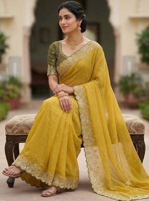 Yellow Color Embroidery Thread and Zari Work georgette Saree 1