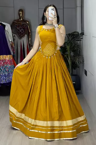 Mustard Color Fancy Plain Lehenga With Lace Patti Work Blouse For Navratri - full stitched free size
