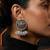 Oxidized silver peacock motif statement earrings with white pearl cluster drops