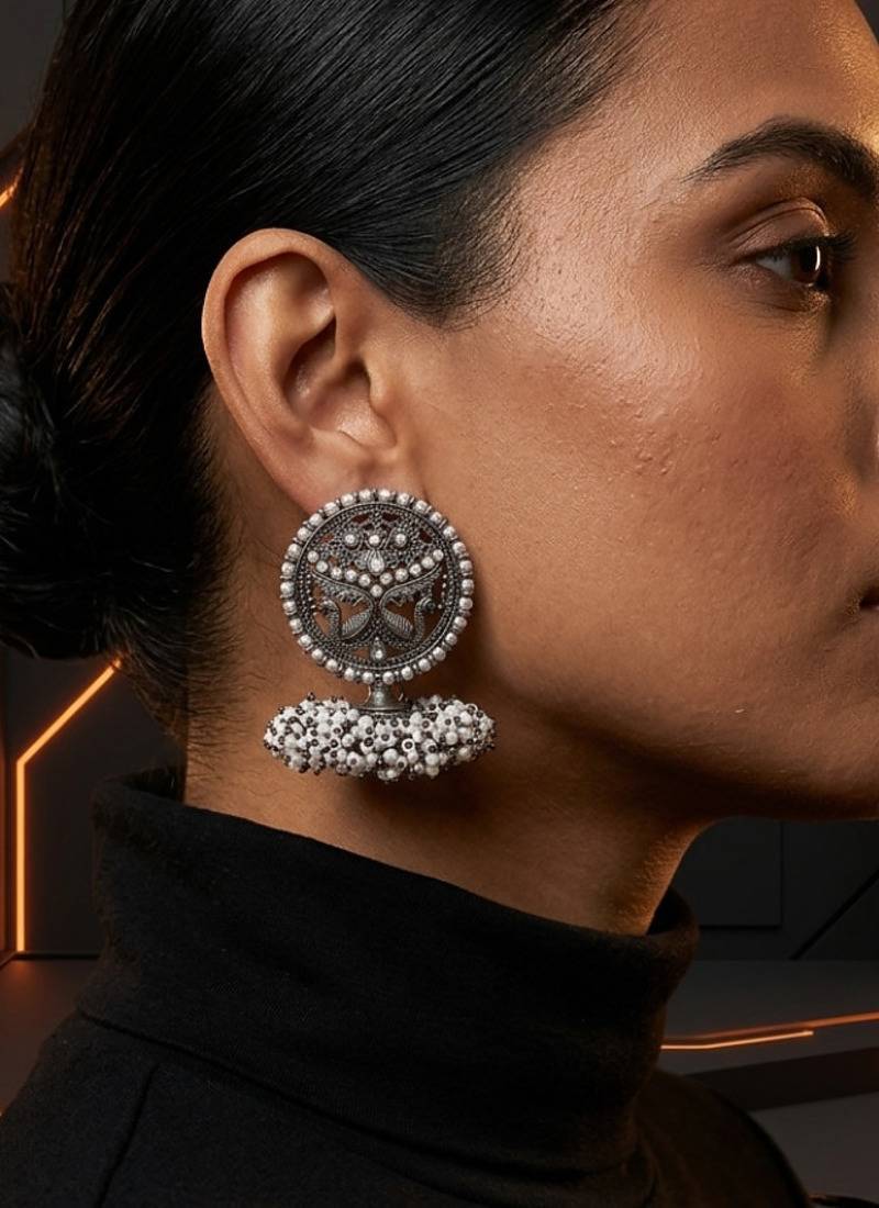 Oxidized silver peacock motif statement earrings with white pearl cluster drops