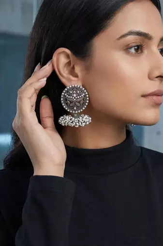 Oxidized silver peacock motif statement earrings with white pearl cluster drops