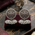 Oxidized silver peacock motif statement earrings with white pearl cluster drops