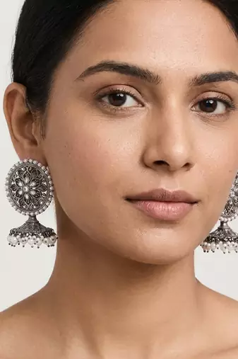 Oxidized flower silver  motif statement earrings with white pearl cluster drops
