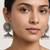 Oxidized flower silver  motif statement earrings with white pearl cluster drops