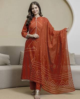 Cotton orange print, mirror & shell tassel work kurta pant dupatta 1