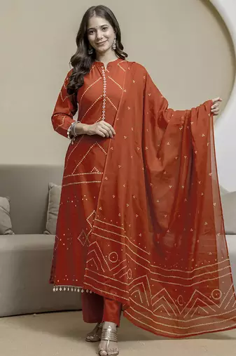 Cotton orange print, mirror & shell tassel work kurta pant dupatta
