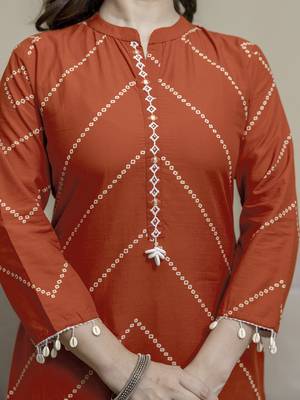Cotton orange print, mirror & shell tassel work kurta pant dupatta 5