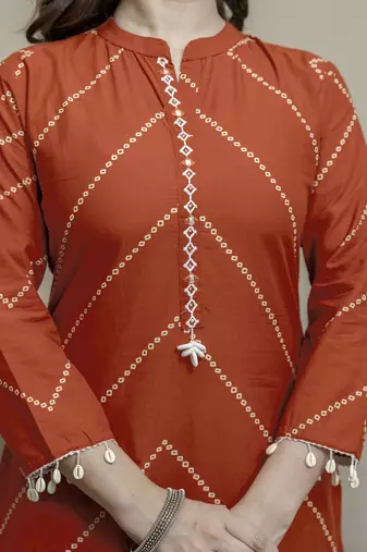 Cotton orange print, mirror & shell tassel work kurta pant dupatta