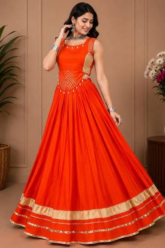 Orange Color Fancy Plain Lehenga With Lace Patti Work Blouse For Navratri