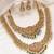 Gold plated faux ruby faux emerald & lariya studded necklace earrings bridal jewellery set