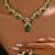 Gold plated cubic zirconia & faux emerald studded necklace earrings set jewellery for women