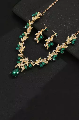 Gold plated cubic zirconia & faux emerald studded necklace earrings set jewellery for women