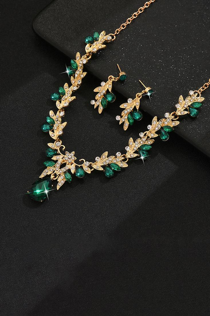Gold plated cubic zirconia & faux emerald studded necklace earrings set jewellery for women