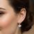 Silver plated pearl studded fancy stylish fish hook insert stud earrings jewellery for women