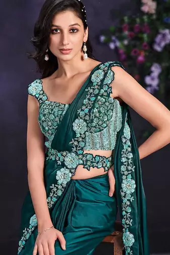 Teal green pre-draped crepe satin silk saree with embroidered blouse and waist belt