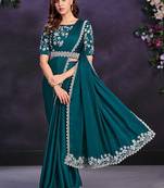 Teal green pre-draped crepe satin silk saree with embroidered blouse and waist belt