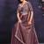 Dusty mauve pre-draped crepe satin silk saree with embroidered blouse and waist belt