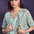 Sea green pre-draped crepe satin silk saree with embroidered blouse and waist belt
