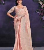 Peach pre-draped crepe satin silk saree with embroidered blouse and waist belt